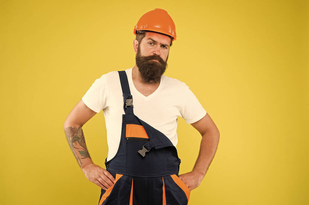 miner wear helmet for safety. expert in building. brutal male worker with beard. he is just artisan. choose your occupation. construction engineer in work uniform. man builder in hard hat - Φωτογραφία, εικόνα