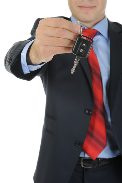 Businessman gives the keys to the car - 写真・画像