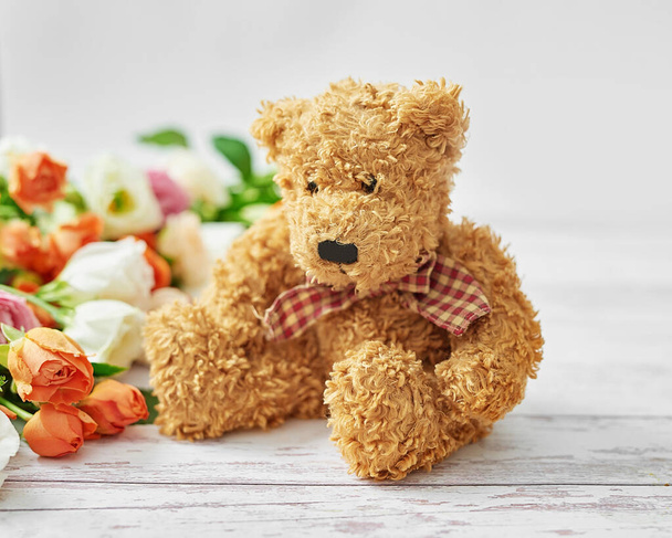 Flowers and gifts for women's day. Mother's day greeting card. Stuffed toys Bear. Bouquet of flowers in vase. Happy Birthday! Valentine's day gift. 14th February. Love concept. - Photo, Image