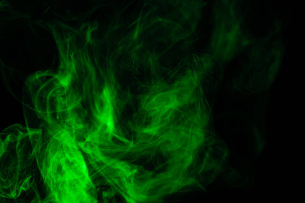 Green steam on a black background. Copy space. - Fotoğraf, Görsel