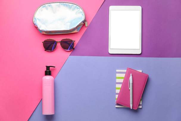Set of travel accessories on color background - Photo, image