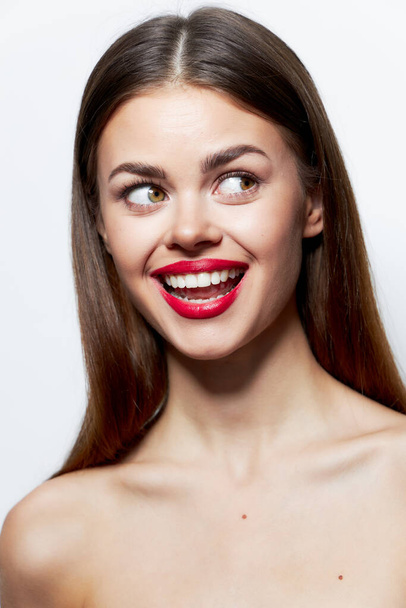 Charming woman Bare shoulders smile fun look to the side spa treatments - 写真・画像