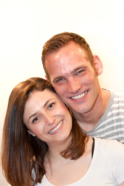 Portrait of a happy young Caucasian couple smiling - Zdjęcie, obraz