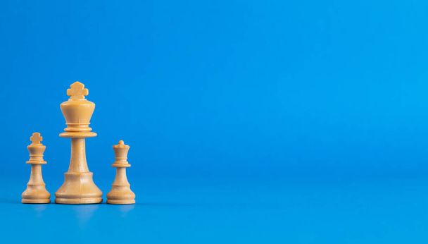 Father's day concept with chess, blue background. - Fotografie, Obrázek
