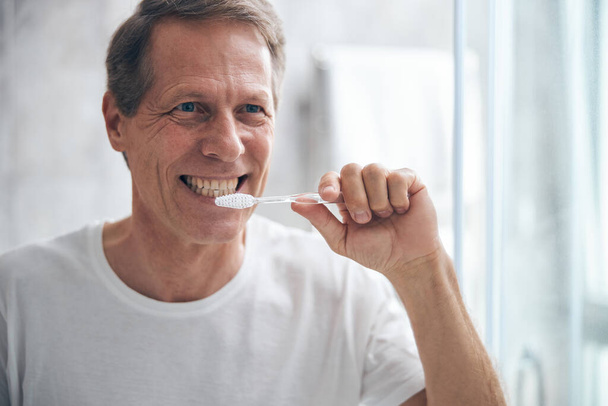 Man taking care of his oral health - Photo, Image