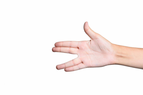 A teenager's hand isolated on a white background. Close up. - Photo, Image