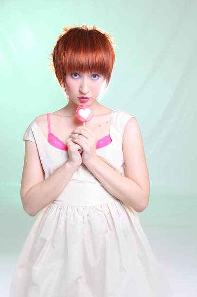 Beautiful model with lollipop - Φωτογραφία, εικόνα