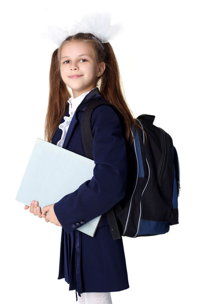 Schoolgirl with backpack isolated on white - Fotó, kép