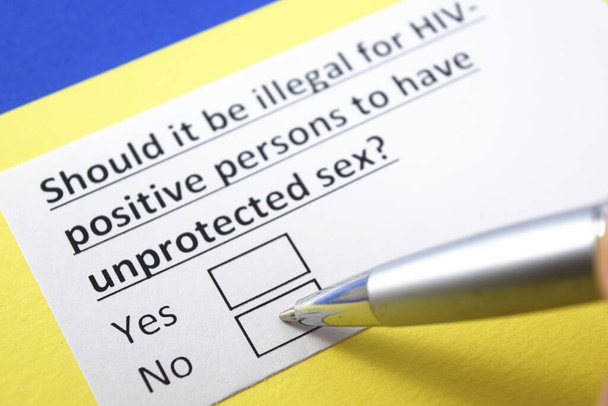 Should it be illegal for HIV postive persons to have unprotected sex? Yes or no? - Foto, afbeelding