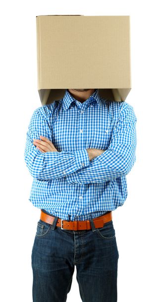 Man with cardboard box on his head isolated on white - Фото, изображение
