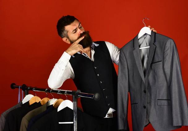 Business fashion and shopping concept. Shop assistant or seller - Φωτογραφία, εικόνα