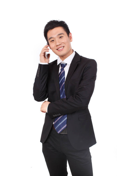 	Portrait of a businessman standing with cellular phono	 - Φωτογραφία, εικόνα