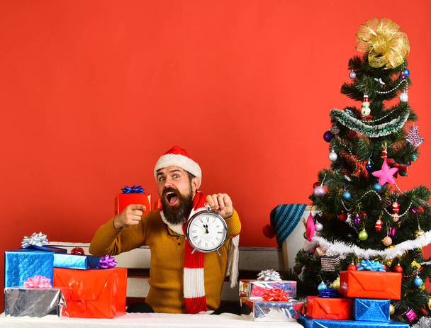 Man with beard and excited face celebrates Christmas - Fotoğraf, Görsel