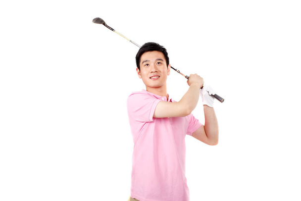 	A businessman playing golf	 - Фото, изображение