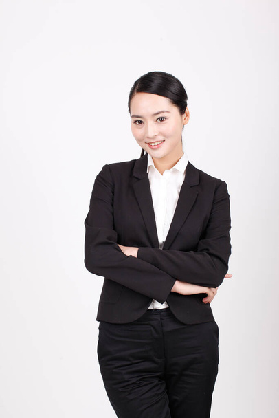 A young business woman standing in different positions - Foto, afbeelding