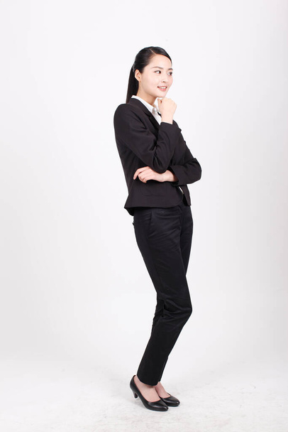 A young business woman standing in different positions - Zdjęcie, obraz