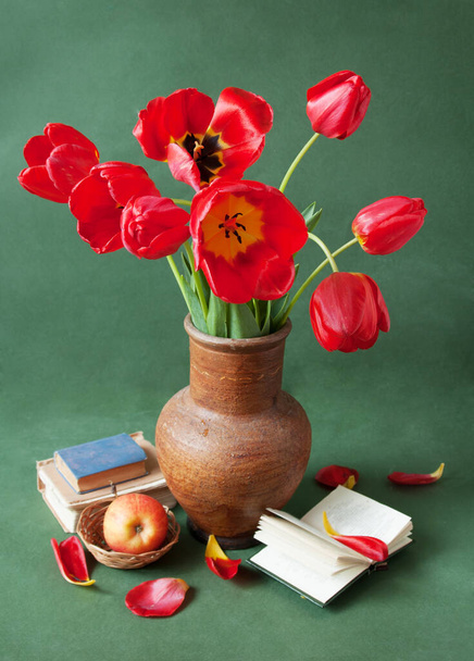 World Teacher's day concept. Flowers bunch, map, globe and books pile - Фото, изображение