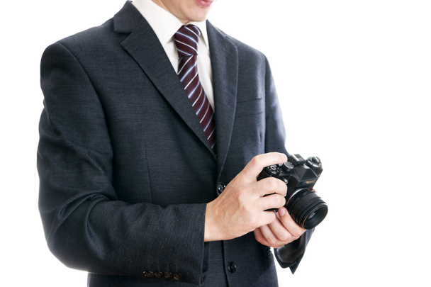 Businessman with camera - Fotó, kép