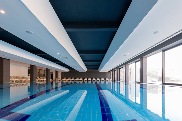 Interior of a indoor swimming pool - Фото, изображение