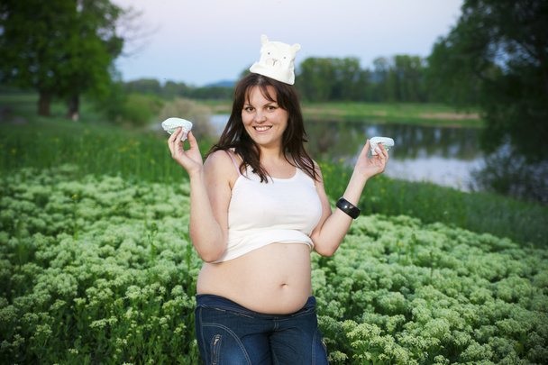 Pregnant woman in nature - Photo, Image