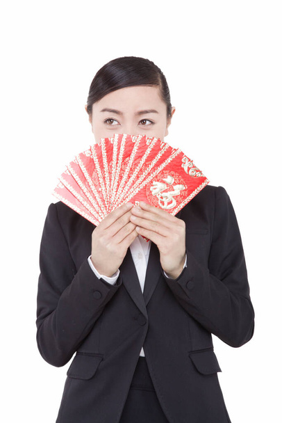 	Business womman holding red envelopes	 - Zdjęcie, obraz