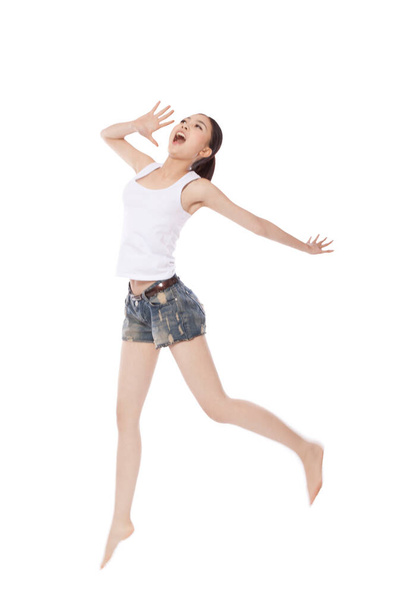 	Young woman jumpping,yelling	 - Φωτογραφία, εικόνα