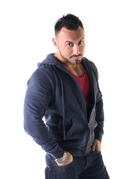 Muscular man with sweatshirt, hands in his pockets - Fotografie, Obrázek