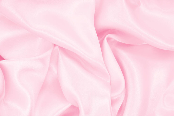 Smooth elegant pink silk or satin texture can use as wedding background. Luxurious background design - Фото, изображение