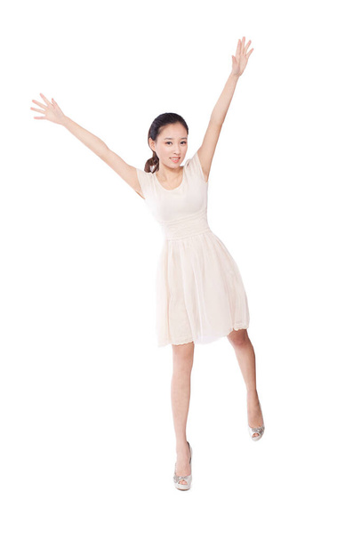 	Young woman standing with arms stretched	 - Foto, Imagen