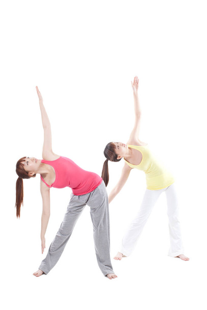 	Portrait of two female friends exercising yoga	 - Fotoğraf, Görsel