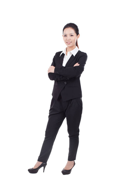 	Portrait of a businesswoman standing in a suit	 - Фото, зображення