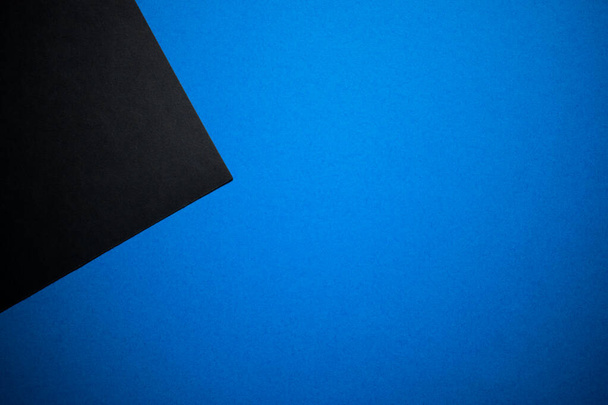 Papel de color geométrico abstracto negro y azul de fondo - Foto, Imagen