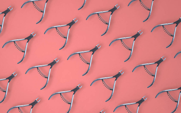 Creative background for nail salon with nail clippers isolated on pink. Concept fashion context  - Photo, Image