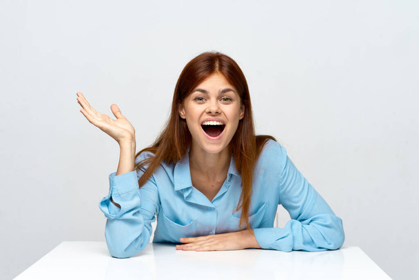 Young businesswoman is surprised in the office              - Фото, зображення