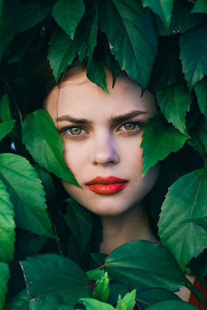 young beautiful woman posing  in the garden                           - Foto, Imagen