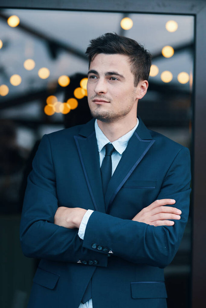 Young handsome businessman  with arms crossed  - Foto, Imagen