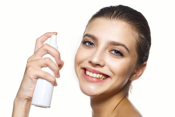  beautiful woman holding beauty product on  isolated   background - Photo, Image