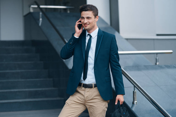 Young handsome businessman with smartphone - Photo, Image