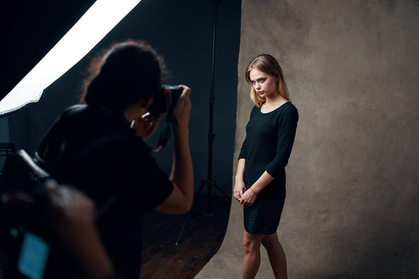 young beautiful woman posing in studio - Photo, Image