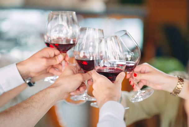 Close-up Of Friends Toasting Wineglasses At Party - Foto, Imagen