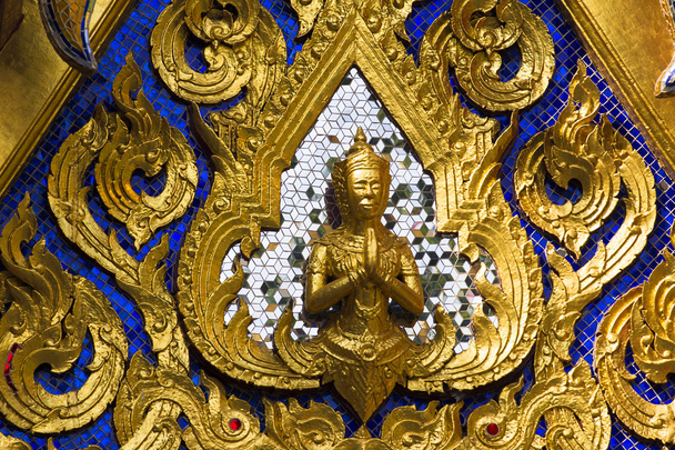 Golden statue at Wat Phra Kaew Temple in Grand Palace in Bangkok, Thailand - Photo, Image