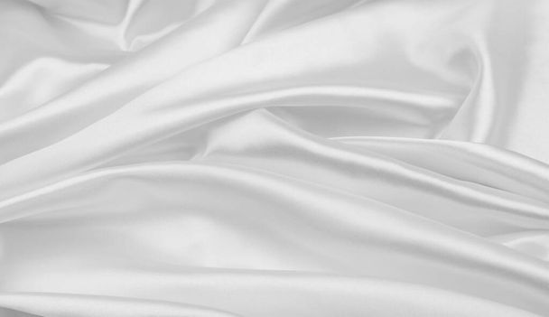 Primer plano de líneas onduladas de tela de seda blanca - Foto, Imagen