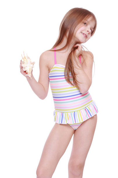 Girl in swimsuit with shell - Φωτογραφία, εικόνα