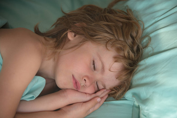 Close-up portrait of sleeping child. Healthy peaceful sleep. - Photo, image
