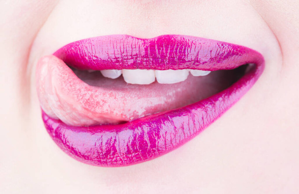 Woman lip, female lips. Close up, macro with beautiful mouth. Tongue and sexy mouth. Sexy lips, tongue out. Beautiful sexy woman. Beautiful lip, lipstick and lipgloss, passionate. - Photo, Image