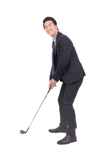 	Business man holding golf swing and smiling at the camera	 - Fotó, kép