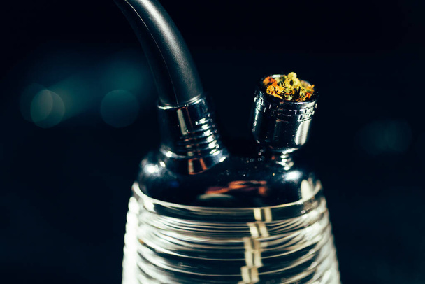  Close-up of a beautiful glass bong with marijuana  - Фото, изображение