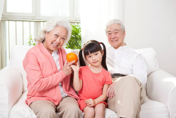 	Senior couple with granddaughter 	 - Foto, imagen