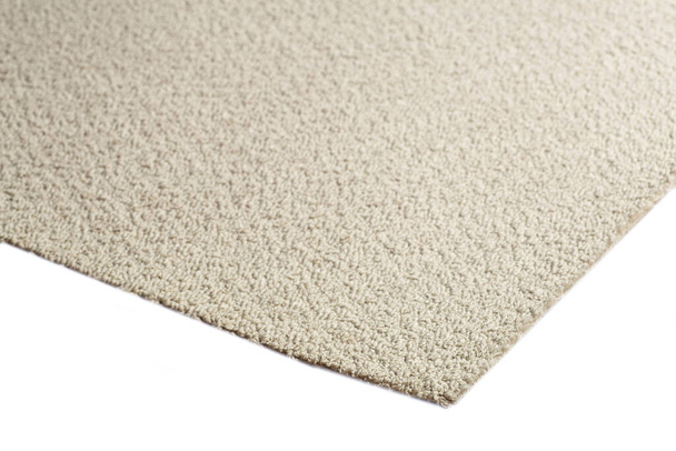 Beżowy dywan w tle. Szary dywan z teksturą na powierzchni. Materiały i przedmioty do aranżacji wnętrz pomieszczeń i domów - Zdjęcie, obraz