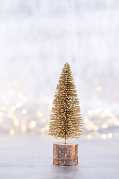 Christmas tree on silver, bokeh background. - Фото, зображення